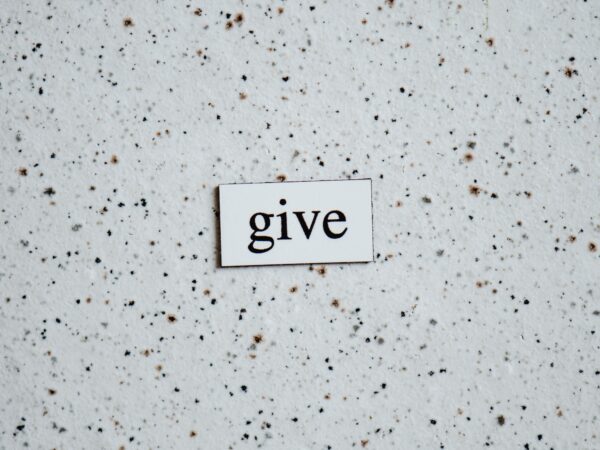 magnet with the word Give Photo by Eva Bronzini: https://www.pexels.com/photo/text-on-a-white-surface-5941398/