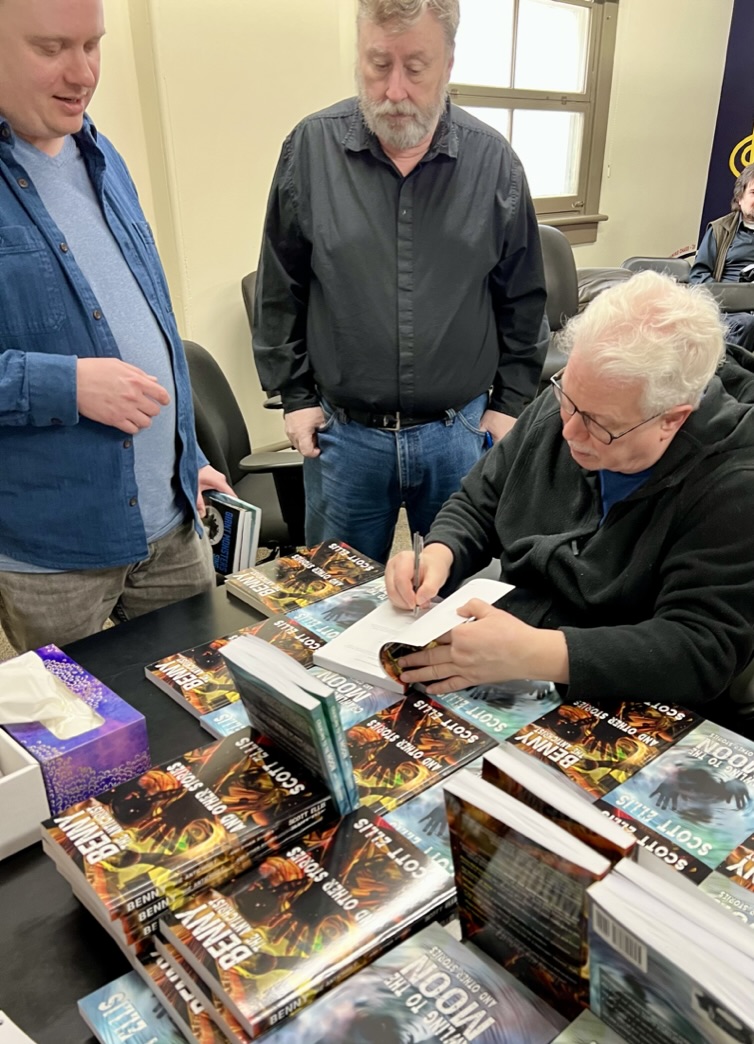 Scott Ellis signing books